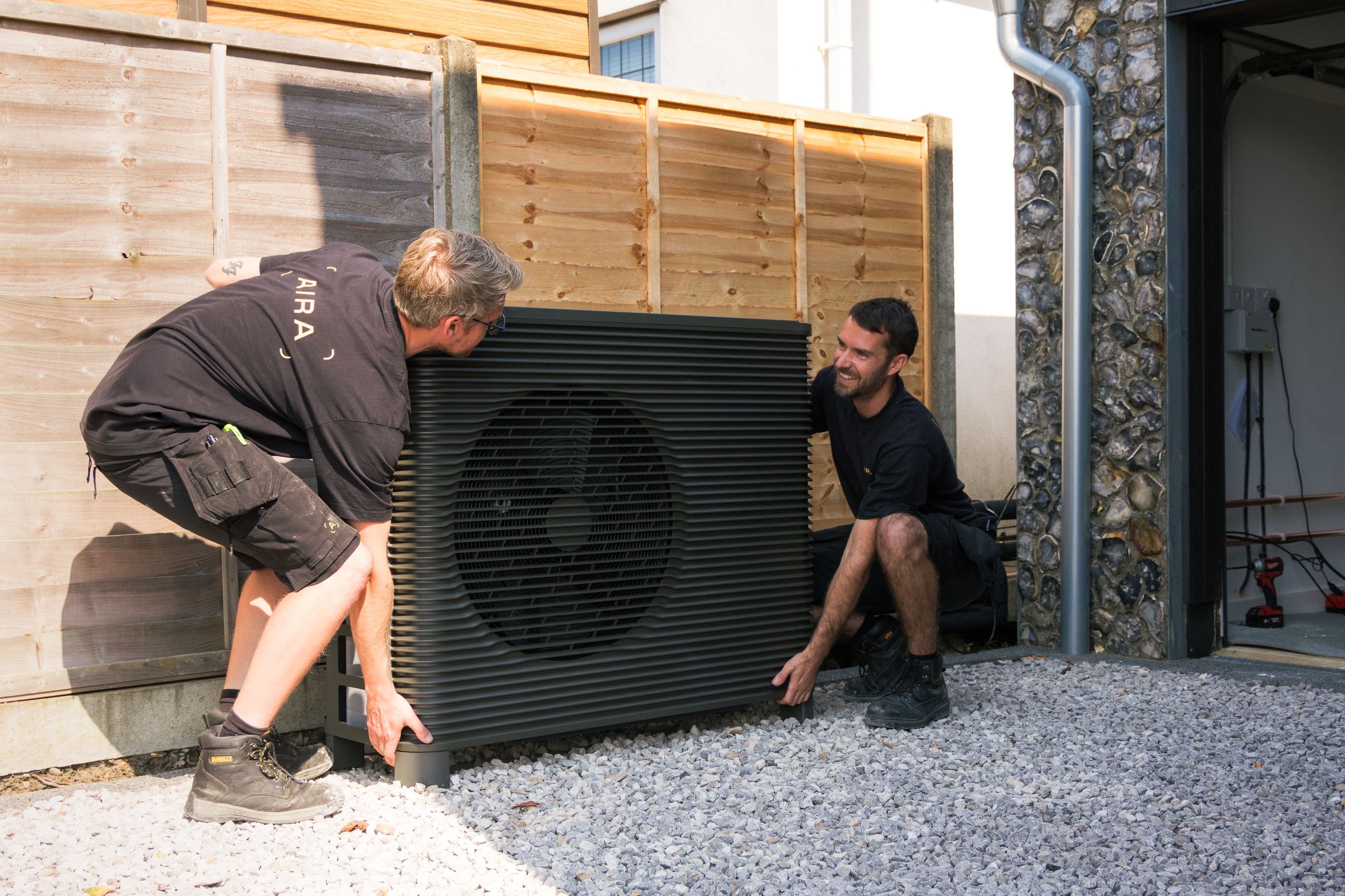 Aira Technicians installing an Aira Heat Pump